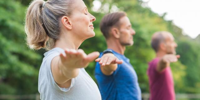 Group of people doing yoga