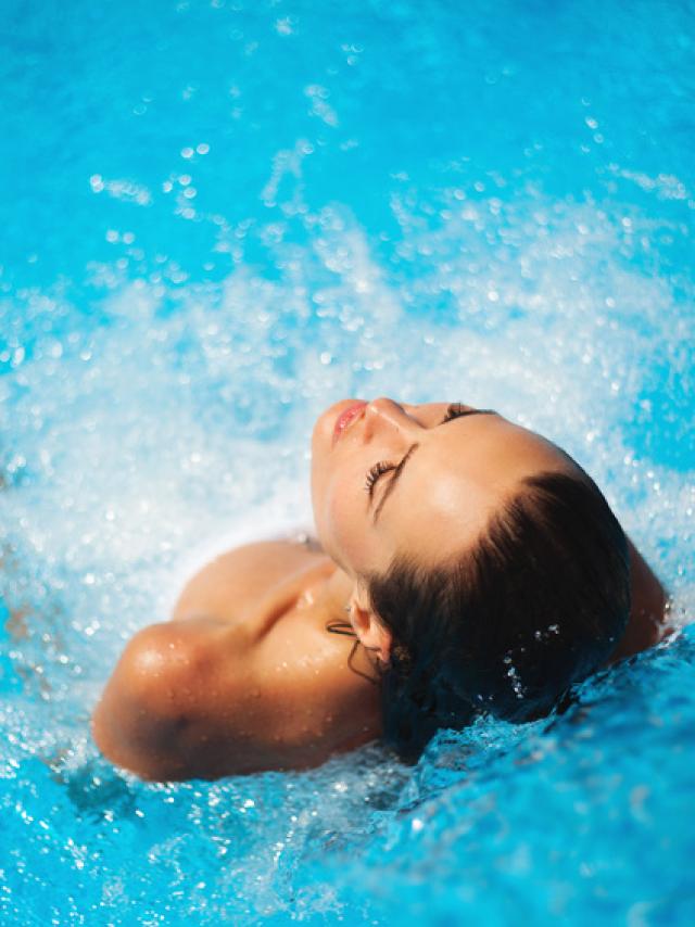 Beautiful woman in a swimming pool